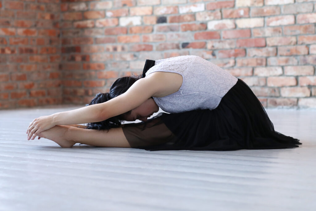 Paschimottanasana or seated forward bend